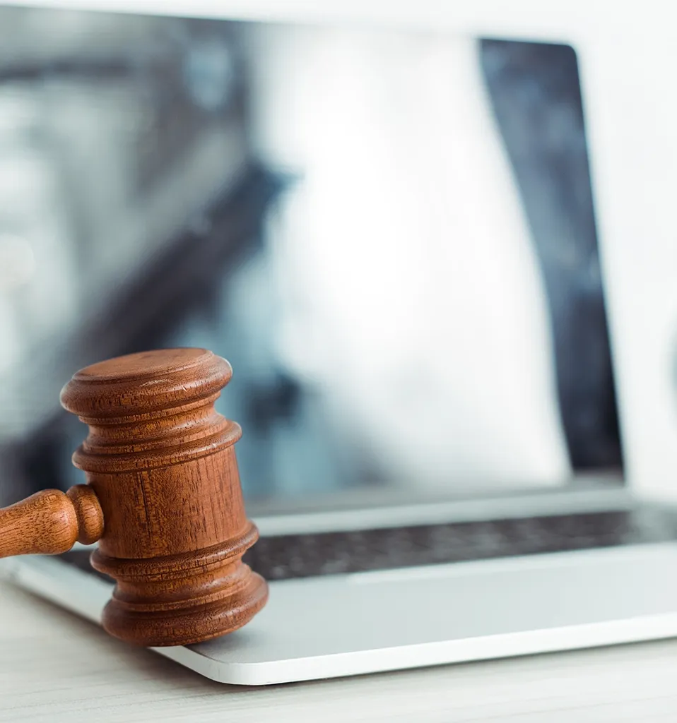 selective focus of wooden gavel near laptop and mo 2024 11 17 05 47 35 utc